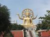 Wat Phra Yai (Big Buddha Temple) in the town of Buphut on the island of Ko Samui. The statue is 12 meters (39 ft) tall. Visitors must ascend and descend the stone stairs without shoes. 