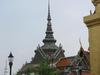 The Grand Palace is a complex of buildings in central Bangkok on the banks of the Chao Phraya River. Construction of the Grand Palace began in 1782 and it served as the official residence of the king and the royal family until 1925. It is still used for official events. Several royal offices are housed on the palace grounds. Shown in this view is the amazingly detailed floral roof of Chakri Maha Prasat Hall.