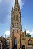 Tower, spire, and part of the outer wall of the old St. Michael's Coventry Cathedral, England. Built in the late 14th and early 15th centuries, the church was bombed and almost obliterated during the Blitz in 1940. Today it stands next to the new cathedral and serves as a place of reflection and reconciliation.