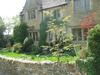 An inviting cottage in the town of Bournton-on-the-Water, Cotswolds district, England.