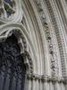 A close up of one of the York Minster entrances highlighting some of the replacement carvings installed as part of the restoration effort.