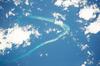 Astronaut photo of Kingman Reef, a largely submerged, uninhabited triangular structure in the North Pacific Ocean, roughly halfway between the Hawaiian Islands and American Samoa. The reef lagoon is 82 m (270 ft) deep at the western part and the total enclosed area is about 76 sq km (29 sq mi). The east-west and northwest-southeast trending small strips of dry land are composed of coral rubble and giant clamshells. The highest point on the reef is less than 1.5 m (5 ft) above sea level, which is awash most of the time, making Kingman Reef a maritime hazard. Image courtesy of NASA.