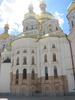 Another view of the Uspensky Sobor (Dormition Cathedral) at the Kyiv Pechersk Lavra (Kyiv Monastery of the Caves) complex. The unpainted section is meant to show what an earlier version of the church looked like before its 17th-century reconstruction in the Cossack Baroque style.