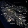 Los Angeles at night as seen from the International Space Station. After sunset, the borders of "The City of Angels" are defined as much by its dark terrain features as by its well-lit grid of streets and freeways. Over 13 million people inhabit the coastal basin bounded roughly by the Santa Monica and San Gabriel Mountains to the north and the Chino Hills and Santa Ana Mountains to the east and southeast. Image courtesy of NASA.