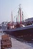 A typical lobster boat docked along Cape Cod in Massachusetts.