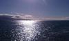 The late afternoon sun sparkles on the channel between Lahaina, Maui and the island of Lanai.