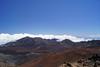 Multicolored cinder cones in Haleakala (House of the Sun) Crater on the island of Maui. The tallest peak on the mountain is 3,055 m (10,023 ft) above sea level, which is frequently high enough to overlook the clouds.