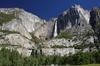 This iconic view of Yosemite Falls, a major attraction in Yosemite National Park in California, shows both the upper and lower falls. The falls come from Yosemite Creek, rushing in the spring from snow melt. The upper fall plunges some 436 m (1,430 ft) from the valley rim, making it alone among the 20 highest falls in the world. The combined drop of 739 m (2,425 ft) for the upper fall, middle cascades, and lower fall make Yosemite Falls the highest measured falls in the United States.