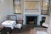 The interior of the multi-purpose room. The Jeffersons' bed sits to the immediate right. Everything else in the room appears in the photo.
