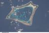 Atafu Atoll in the Southern Pacific Ocean is featured in this image photographed from the International Space Station. At roughly eight kilometers wide, Atafu Atoll is the smallest of three atolls comprising the Tokelau Islands group located in the Southern Pacific Ocean. Image courtesy of NASA.